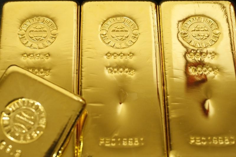 Buy gold as a hedge to these risks: UBS