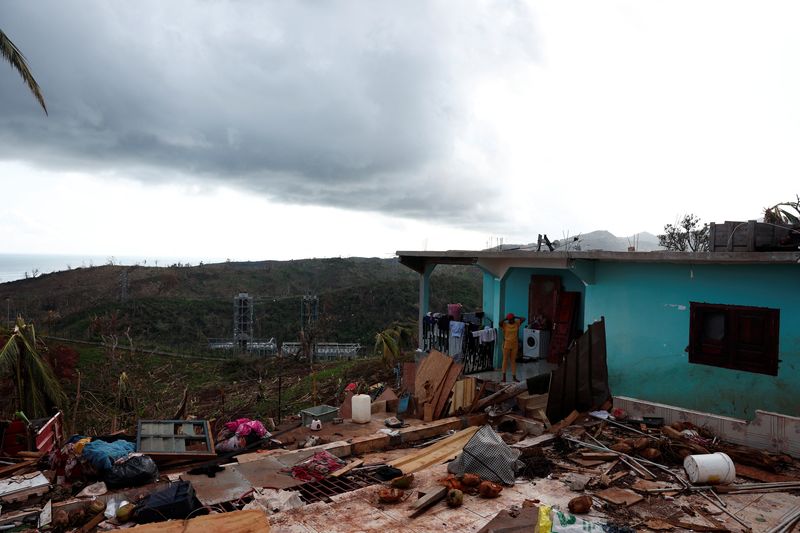 France's Macron arrives in cyclone-battered Mayotte as heavy rains hit islands