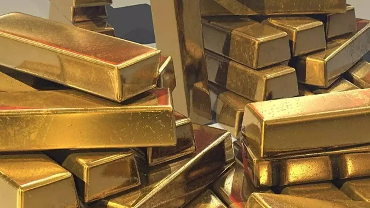 Gold firms on softer dollar, focus on US inflation data