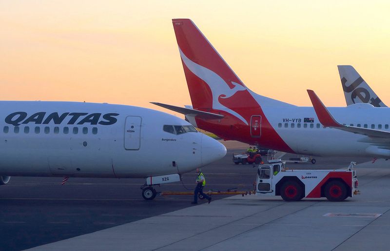 Australia's Qantas told to pay $114,000 to 3 sacked workers in landmark outsourcing case