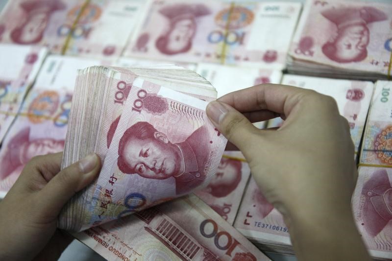 China boosts support for yuan, increases overseas borrowing limits