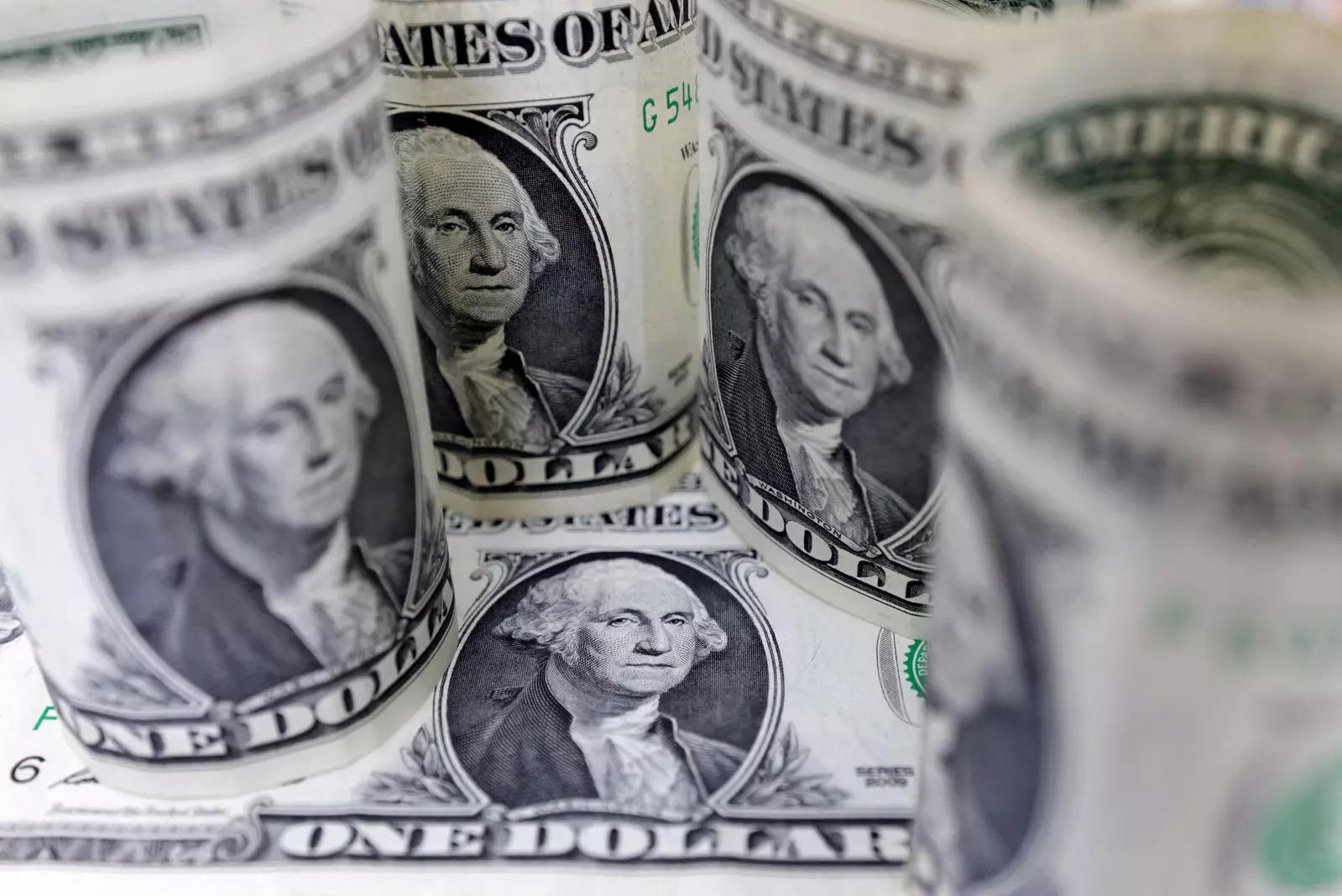 Dollar seesaws ahead of busy central bank week, euro higher after Spain CPI