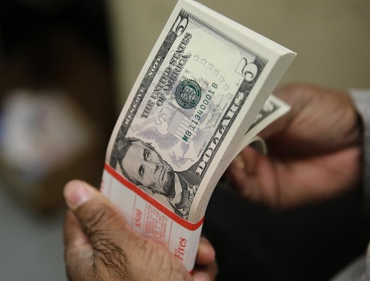 Dollar set for losing week; sterling falls further after retail sales