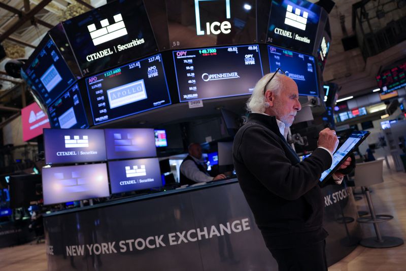 Wall St surges at open after Fed kicks off easing cycle