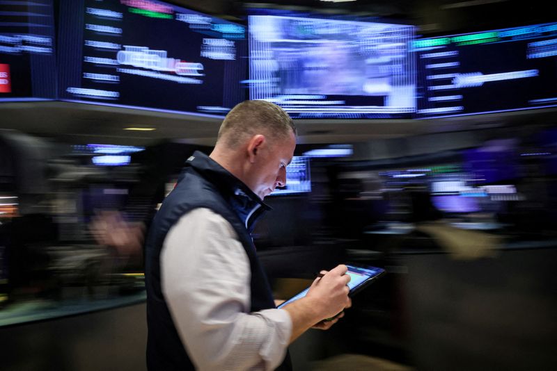 Wall St ends lower ahead of Jackson Hole, snapping multi-session rally