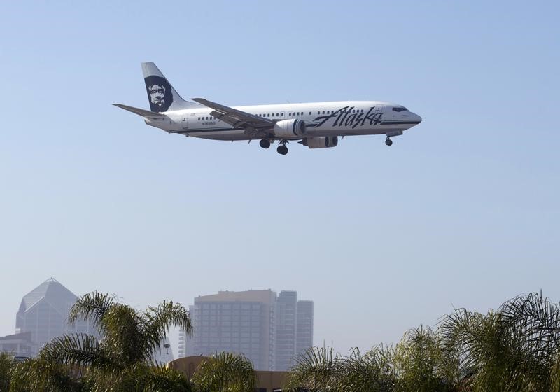 Alaska Air raises profit forecast on strong summer travel