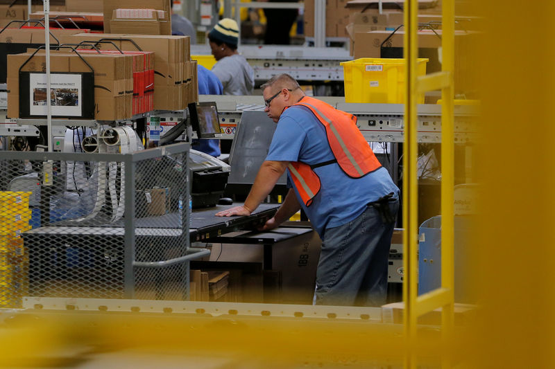 Amazon CEO Jasey said its AI software assistant saved 4,500 years of work