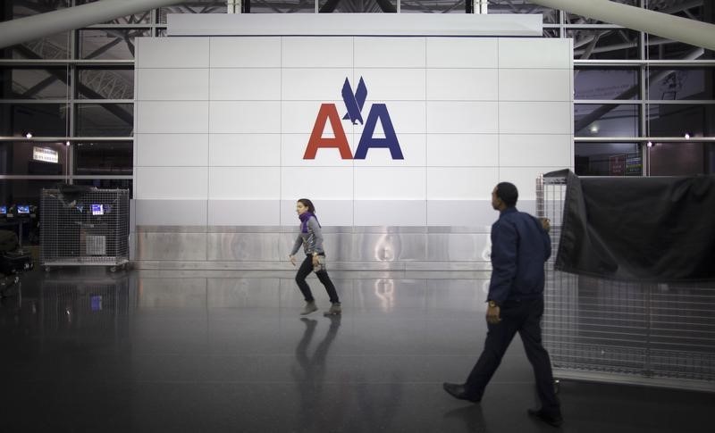 American Airlines stock rises on analyst upgrades