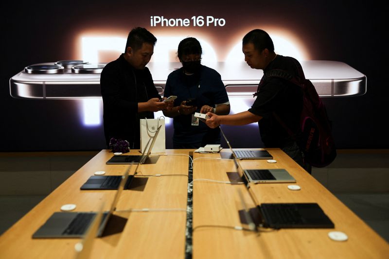 Apple results top Wall Street targets on strong iPhone sales, shares slip on outlook