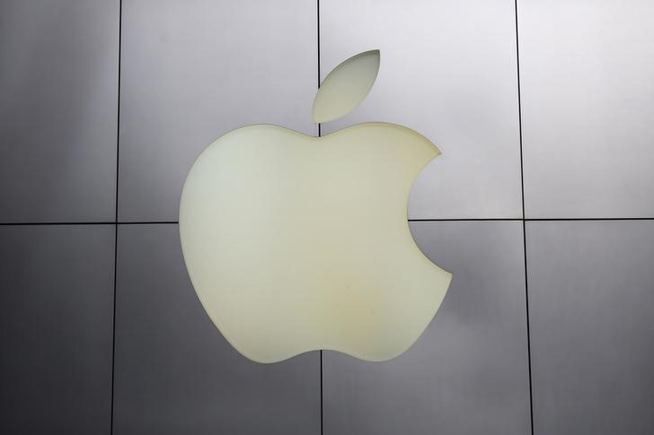 Apple slips; Oracle, Mission Produce surge