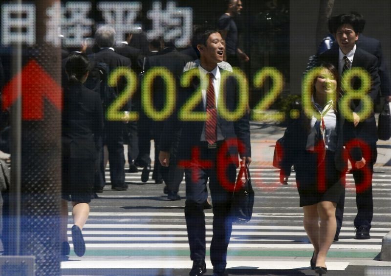 Asia stocks rise as chips, cyclical gains help offset Ukraine war jitters