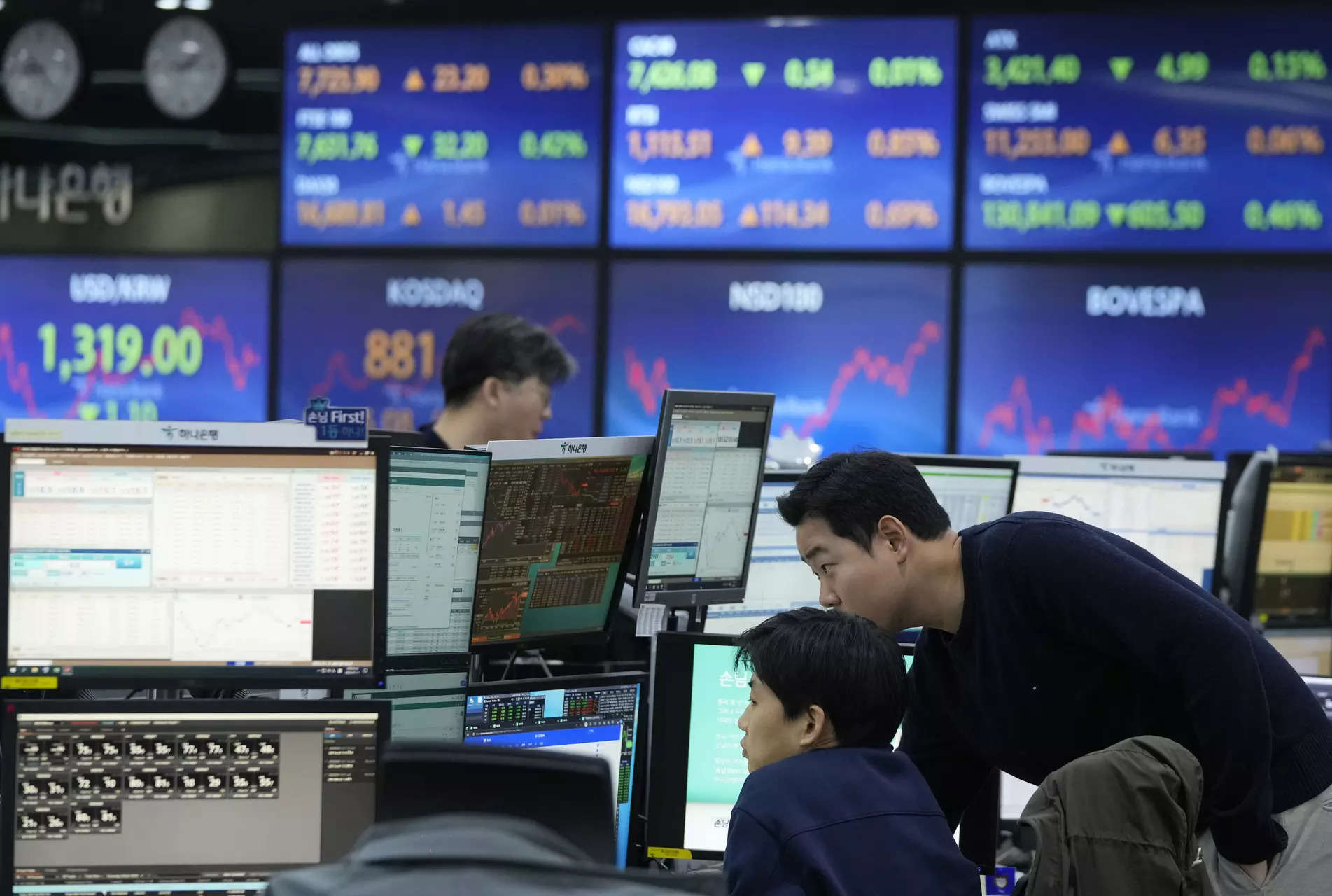 Asian shares retreat as investors question US economic strength