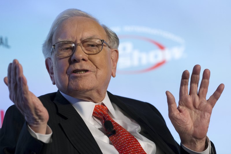 Berkshire sells more Apple shares; stock falls