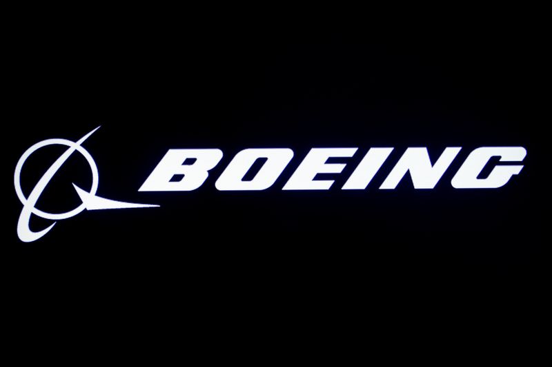 Boeing Seattle workers reach tentative pay deal, avert strike