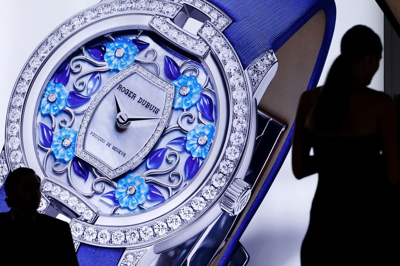 Cartier owner Richemont's profit miss, China caution hit luxury shares