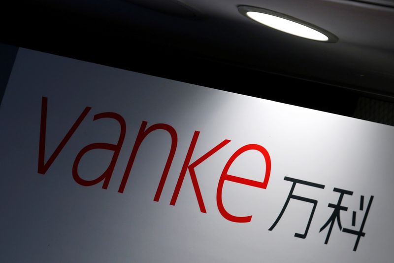 China Vanke's bonds tumble as concerns for state-backed property firm mount