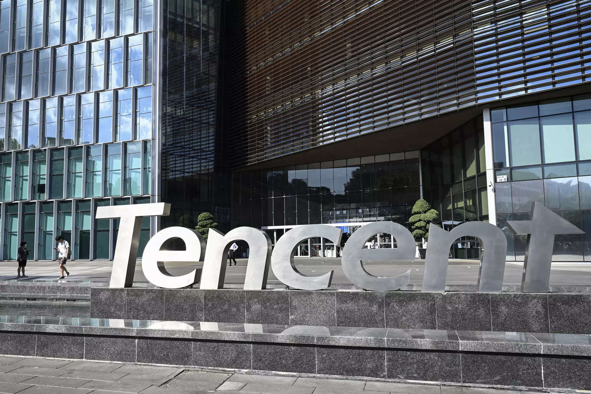 China's Tencent posts weak revenue growth, plans to double buybacks