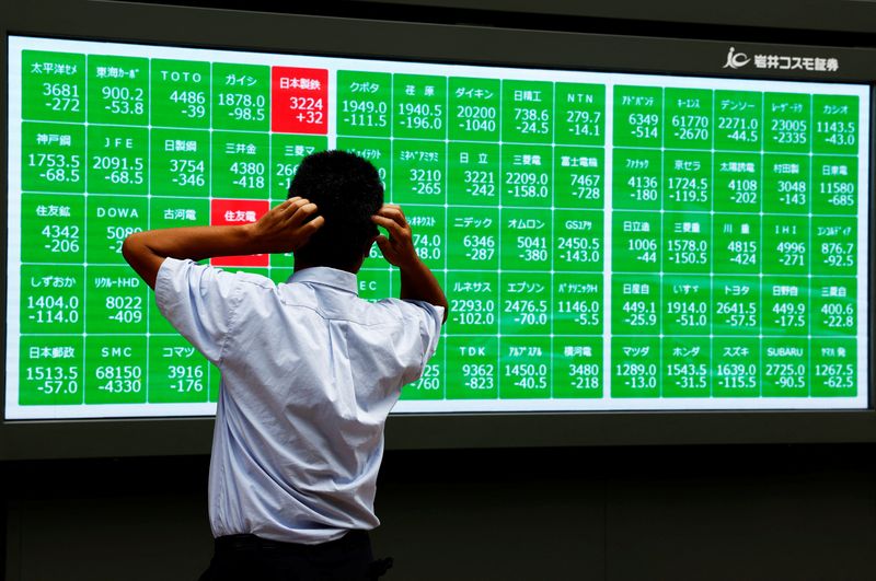 Wall Street tumbles as Fed projects slower rate cuts next year