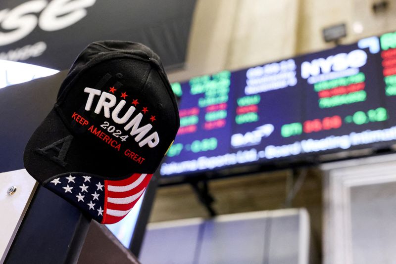 Wall St opens higher as Trump's Treasury selection boosts sentiment