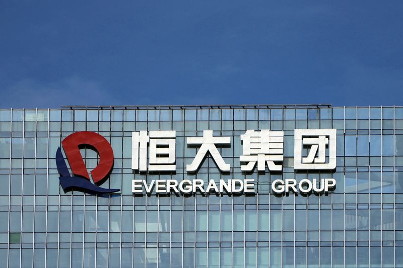 Exclusive-In careful protest, China Evergrande's investors press for action