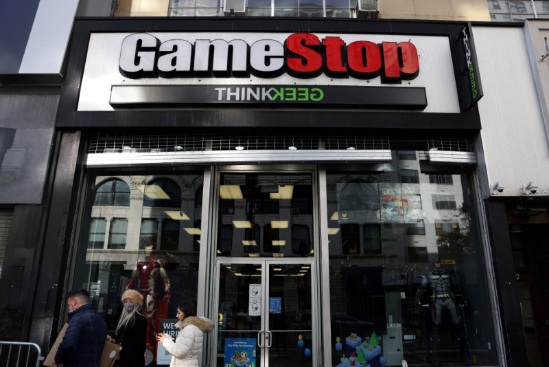 GameStop reports third-quarter profit on spending cuts