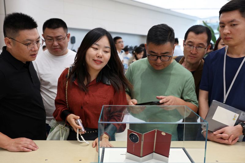 Huawei 'super fans' annoyed at lack of supply as $2,800 phone hits China stores