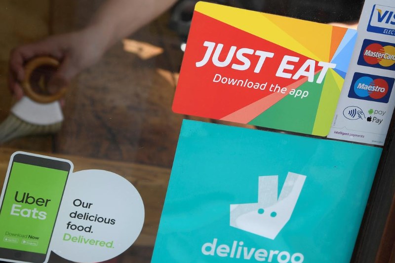 Just Eat Takeaway shares down on delisting from London Stock Exchange