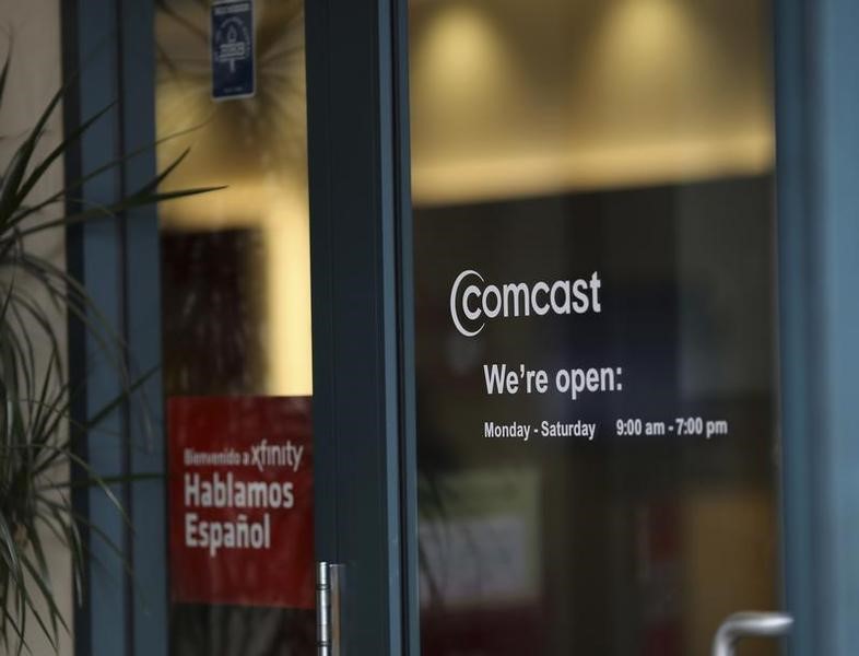 Morgan Stanley upgrades AT&T amid broadband competition; downgrades Comcast