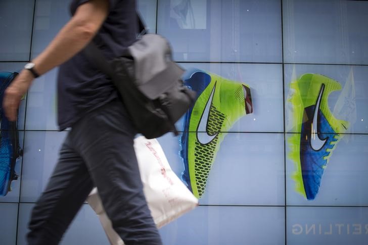 Nike shares fall as JPMorgan turns cautious into earnings