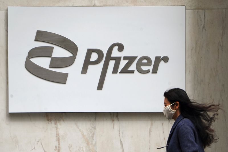 Pfizer and Arcadium Lithium rise premarket; Apple, Amazon and Netflix fall