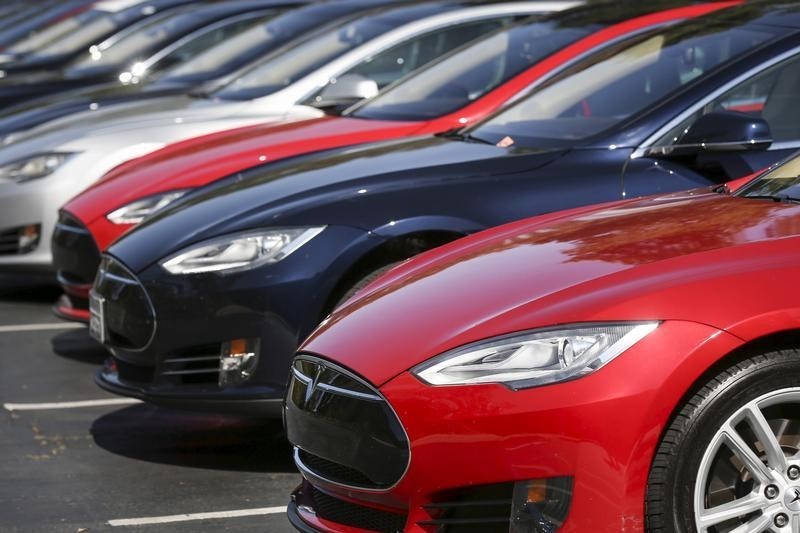 Tesla, Avago lead Tuesday's market cap stock movers