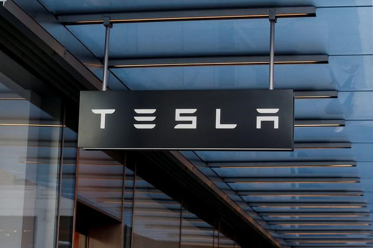 Tesla, MicroStrategy lead market cap stock movers on Wednesday