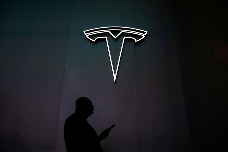 Tesla, Salesforce dip as market cap stock movers shuffle on Thursday