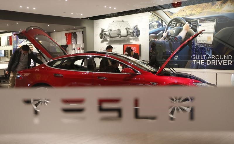 Tesla stock is up 70% since Trump's win. This analyst sees it surging to $500/sh