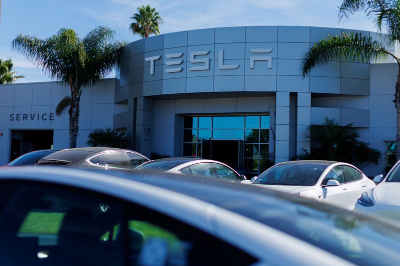 Tesla posts first fall in annual deliveries as demand slows