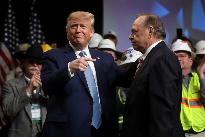 Trump hates Biden's climate law. His allies are making money from it