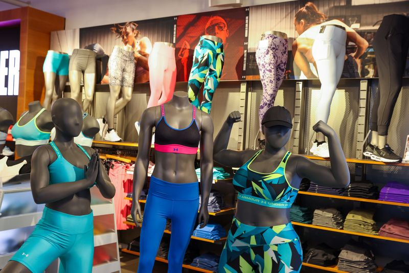 Under Armour lifts profit forecast on cost savings, shares surge