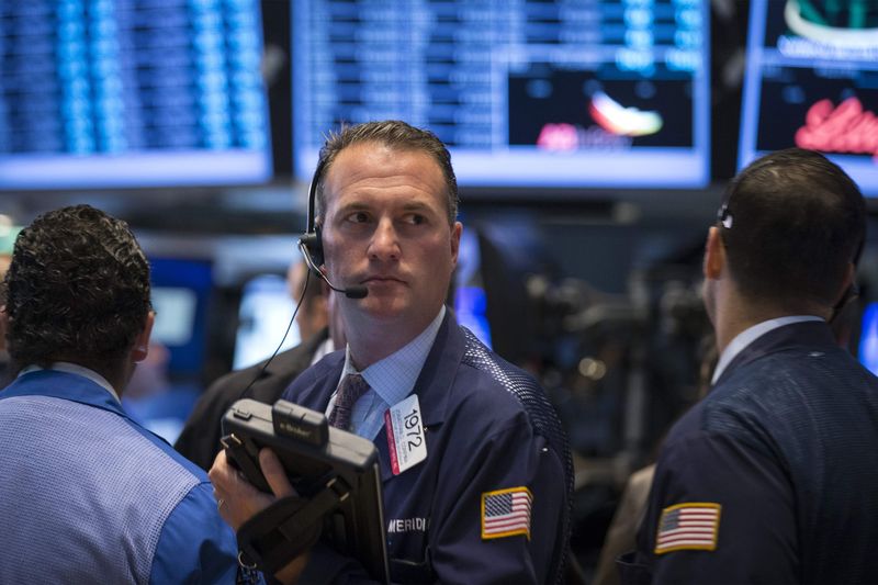 US stocks slip lower; still on course for hefty weekly gains