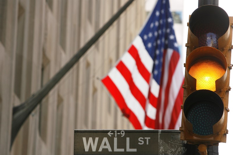 US stocks lower on sharp FedEx losses; weekly gains likely