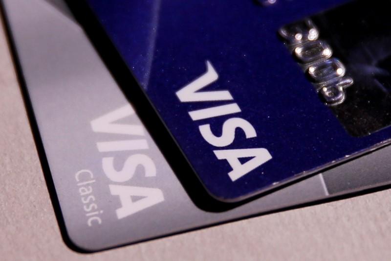 Visa shares drop on report DoJ will sue over debit card market monopoly