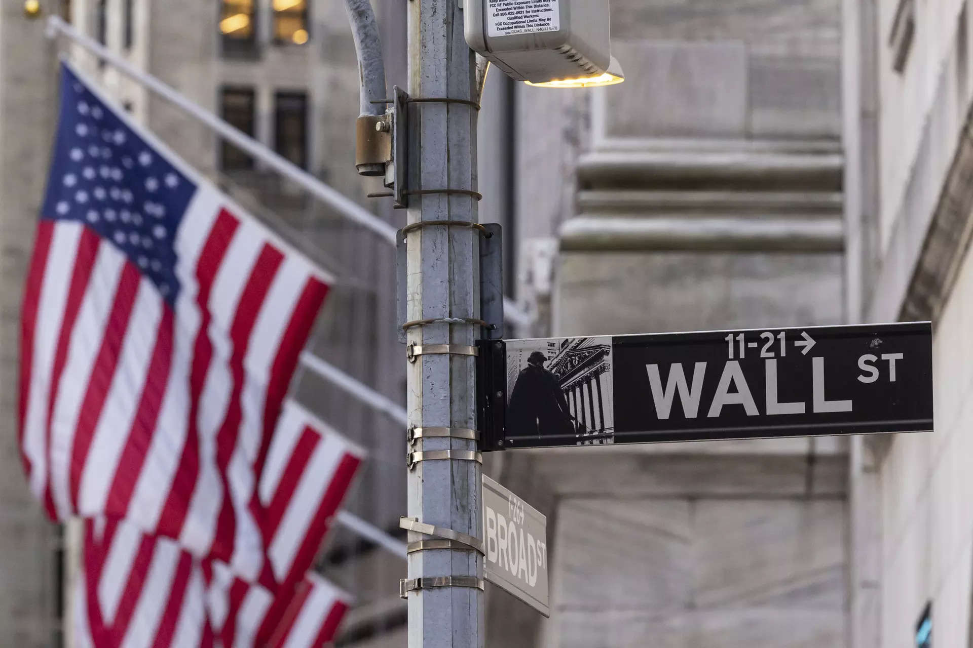 Wall St opens higher on easing bond yields; inflation data on tap