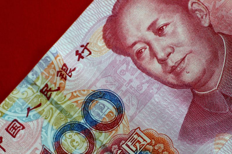 Yuan under pressure after report China is considering weaker currency